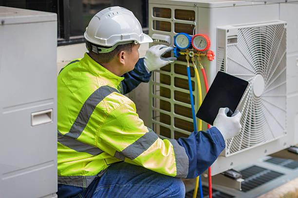 Professional Hvac technician working in Manomet, MA